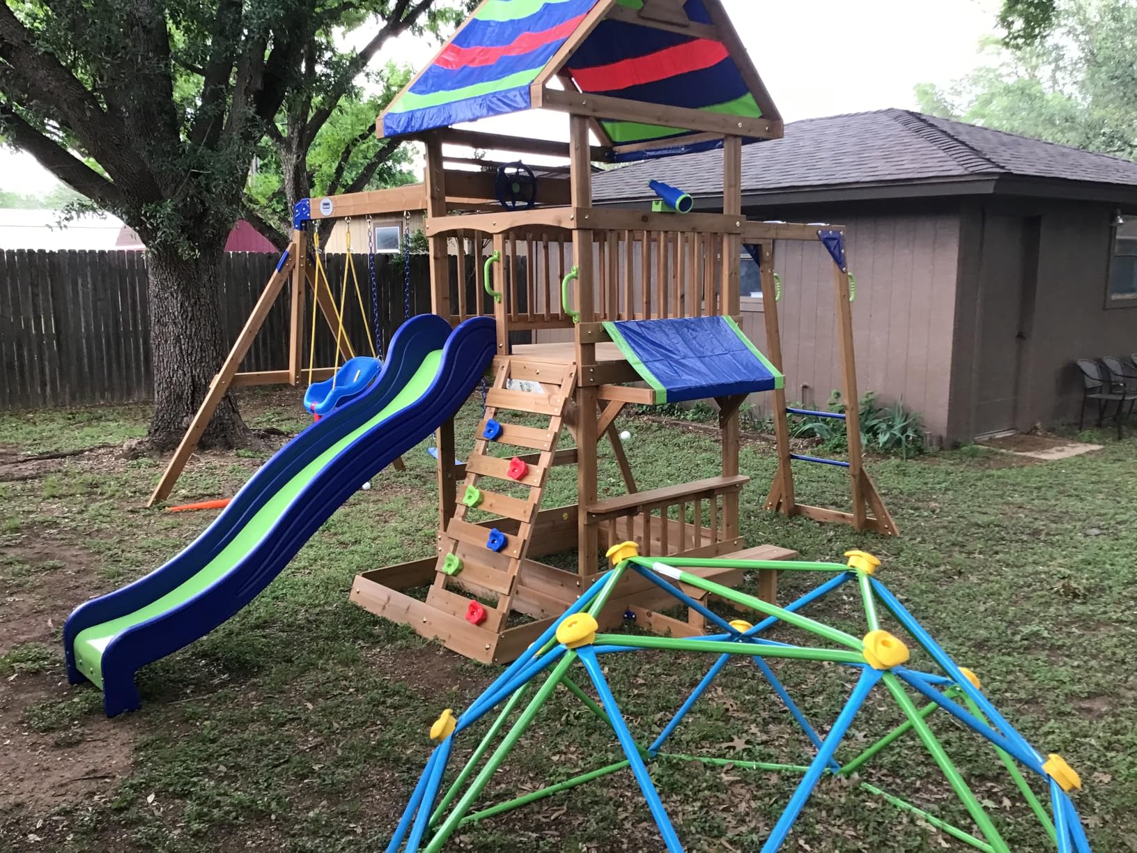 Backyard Discovery Belmont Cedar Wood Swing Set with Wave Slide, Play Deck, Rock Wall Ladder, Snack Bar Window, Shaded Picnic Area, Bench, Belt Swings, Trapeze, Sandbox Area, Canopy, Outdoor Playset customer photo 1