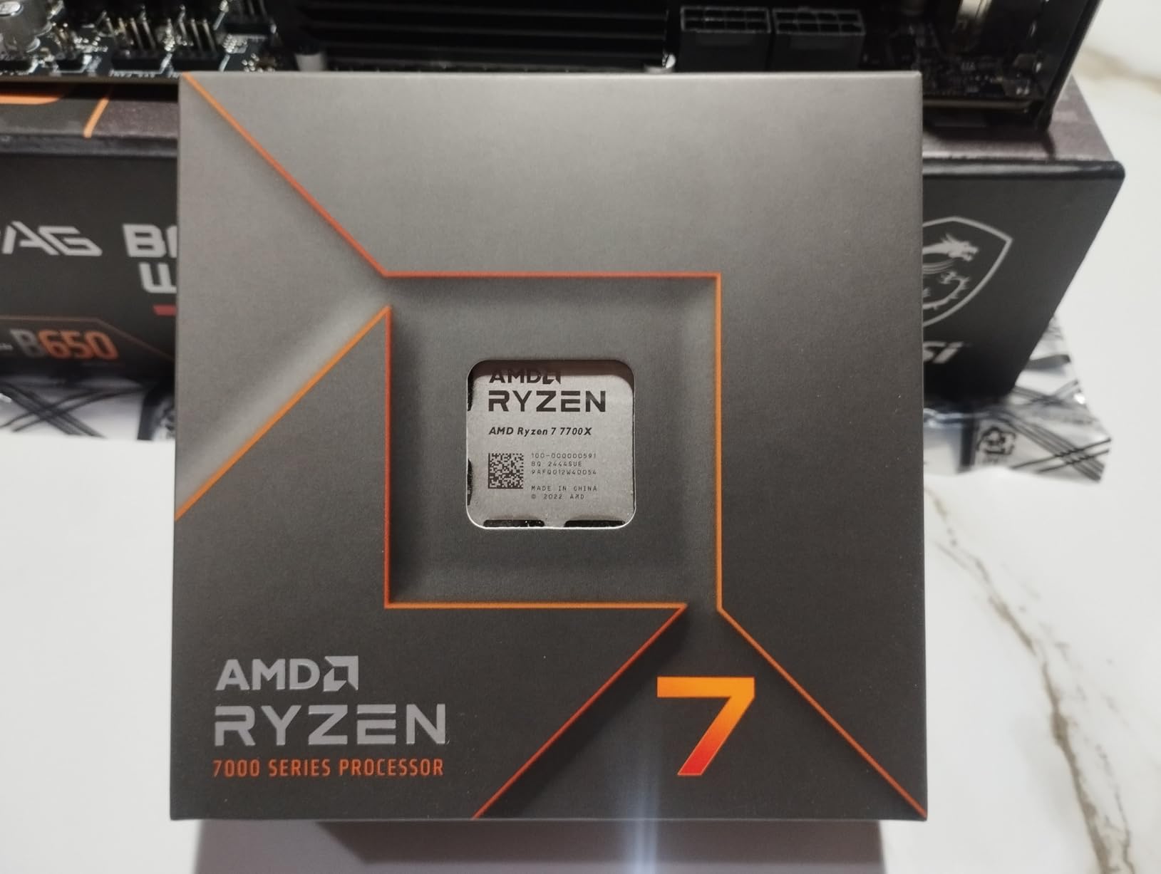 AMD Ryzen 7 7700X 8-Core, 16-Thread Unlocked Desktop Processor customer photo 2