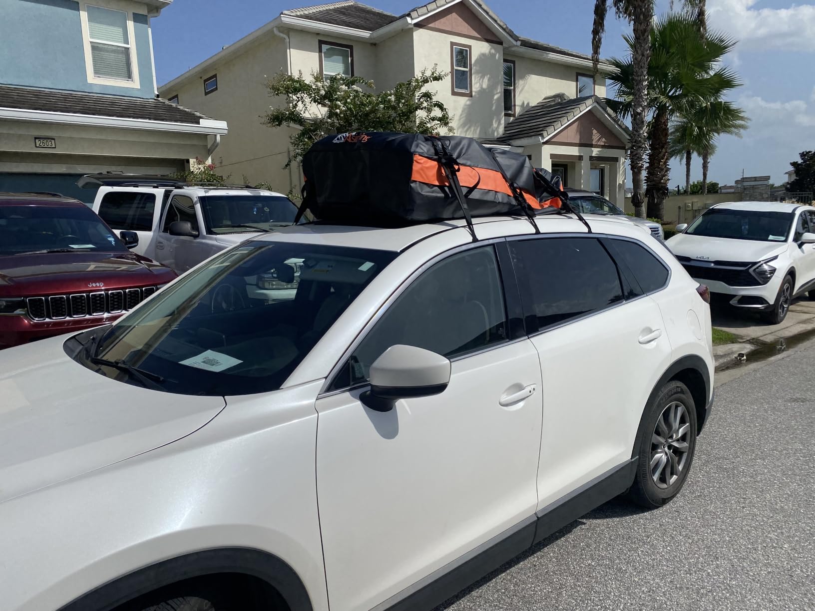 Car Rooftop Cargo Carrier Bag, 16 Cubic Feet Waterproof Car Topper Luggage Storage Bag with Large Capacity & Maximum Protection to Minivan SUV Vehicles w/wo Roof Rack, Non-Slip Mat, Door Hooks, Lock customer photo 1