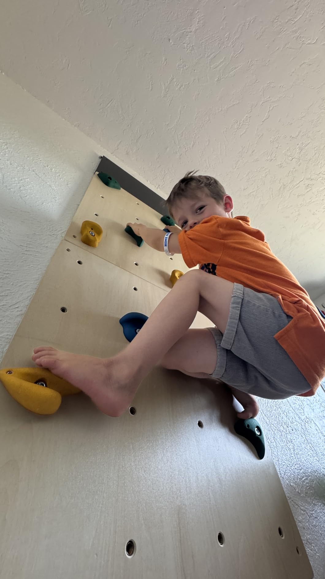 ComfyBumpy Rock Climbing Wall for Kids | Indoor Playground Play Gym Set with Drawing Blackboard & 12 Non-Slip Holds | Durable Wooden Climber for Ages 3+ customer photo 2
