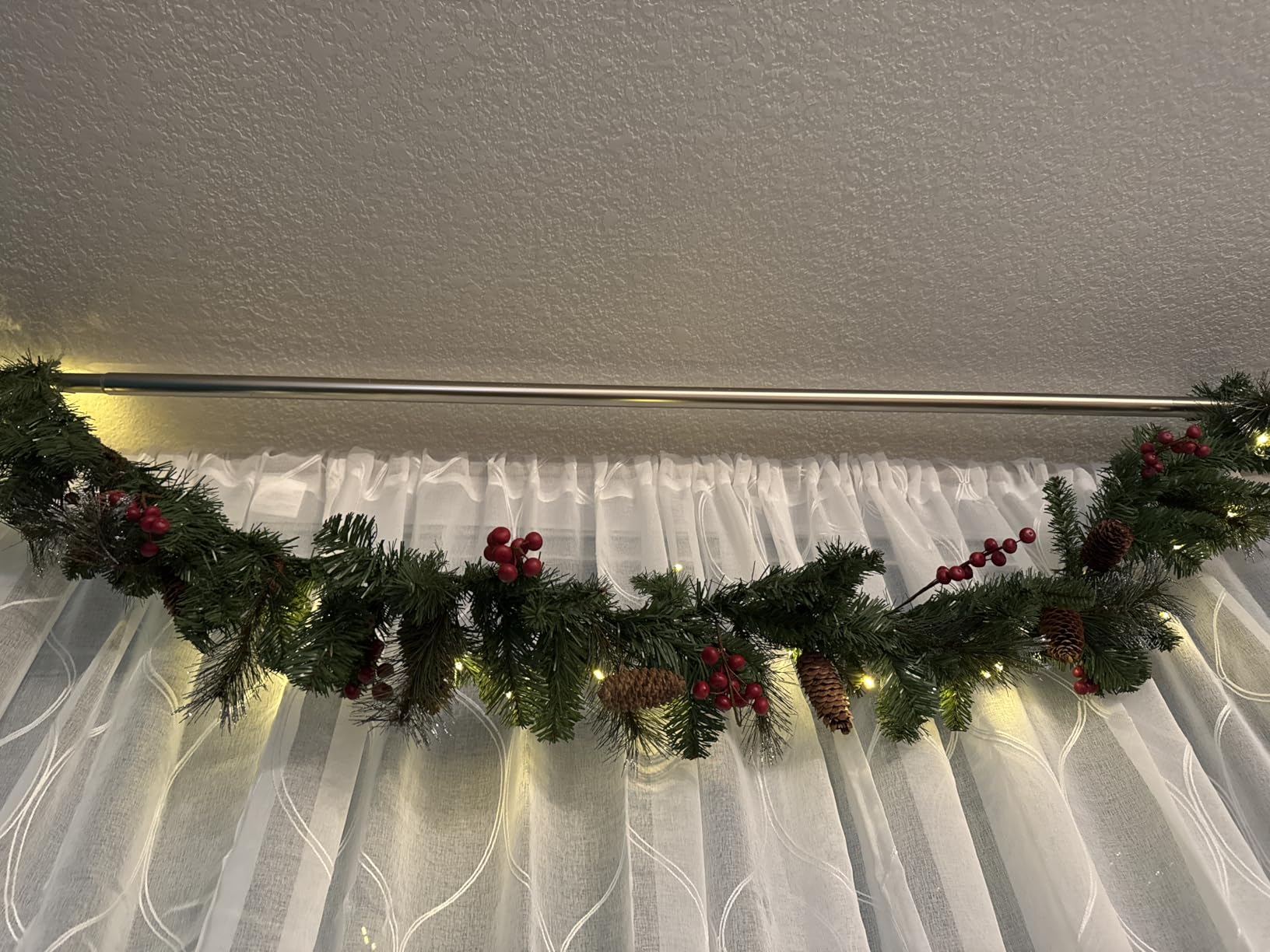 National Tree Company 9ft Pre-Lit Crestwood Spruce Christmas Garland | 50 Warm White LED Lights, 180 Tips, Artificial Christmas Decoration With Glitter, Pinecones, Red Berries, Timer, Green customer photo 2