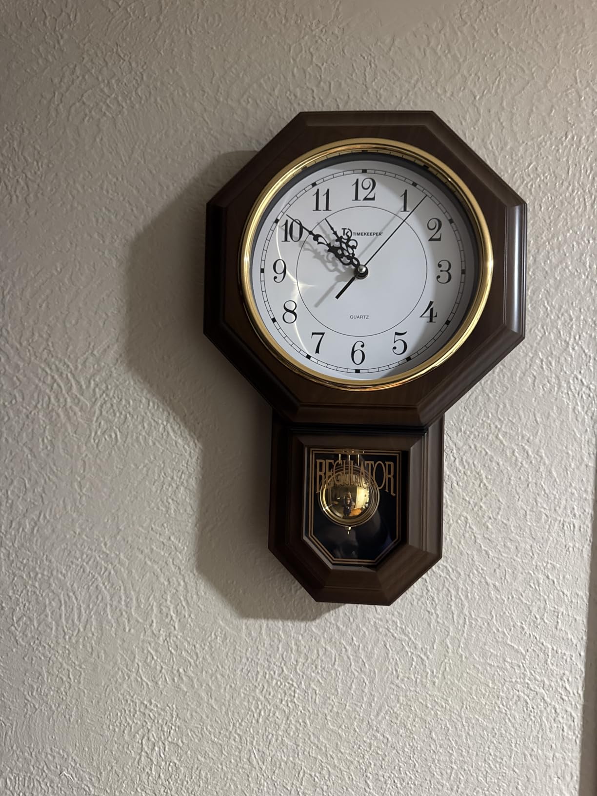 Timekeeper Faux Wood Traditional Pendulum Westminister Chime Clock, Walnut | Classic Westminster Chime | Walnut Frame with Gold Accent | 17.5 x 11.25 In. | Battery Operated customer photo 2