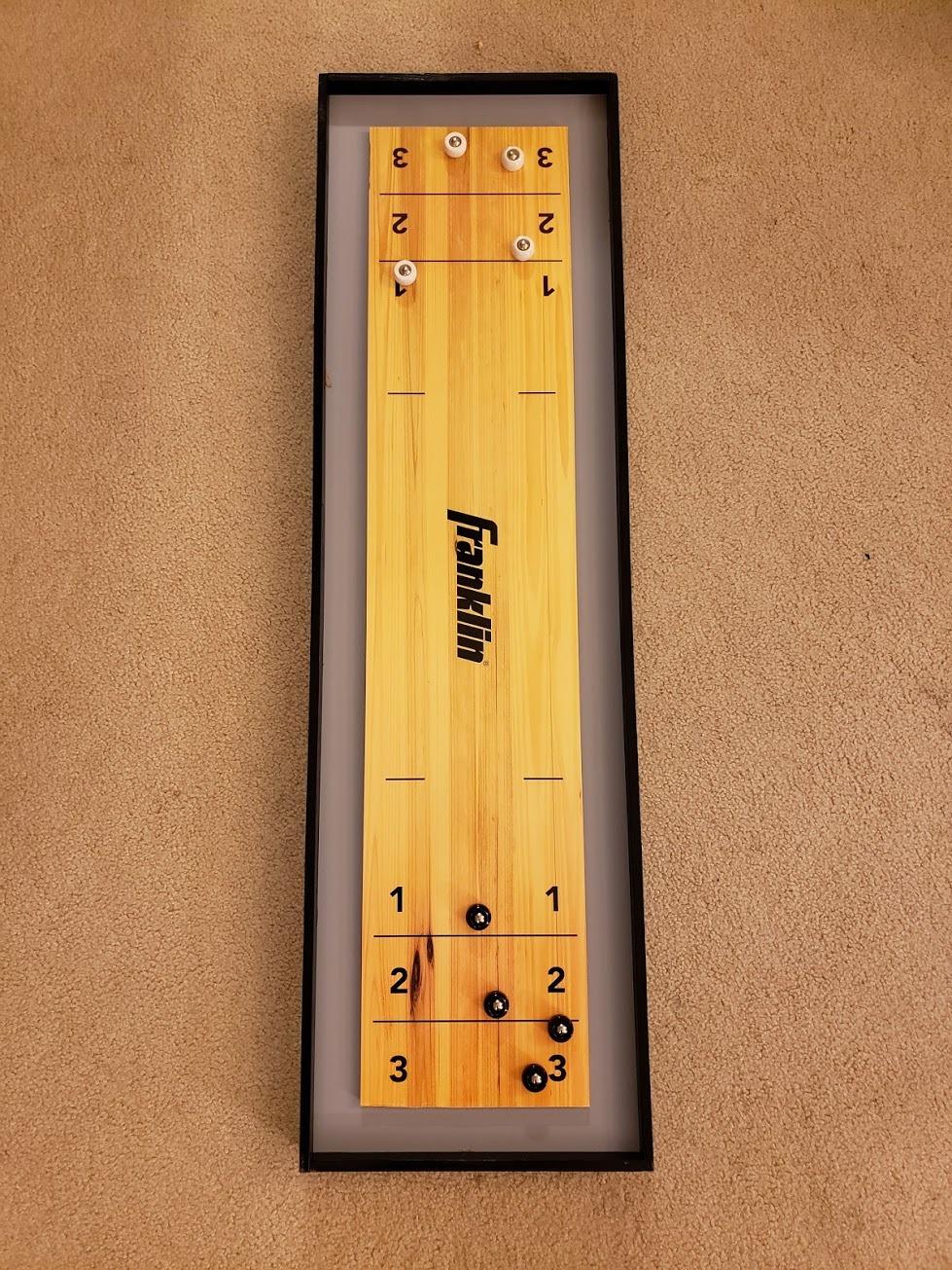Franklin Sports 2-in-1 Shuffleboard Table and Curling Set - Portable Tabletop Set with 8 Rolling Mini Pucks - 45 inch customer photo 1