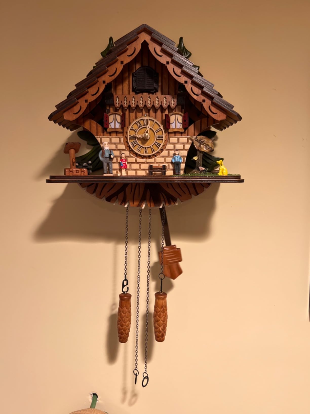 Kintrot Cuckoo Clock for Wall: A Happy Family with a Cute Puppy | Traditional Black Forest Chalet Wooden Clock with Singing Bird and Playing Melodies customer photo 1