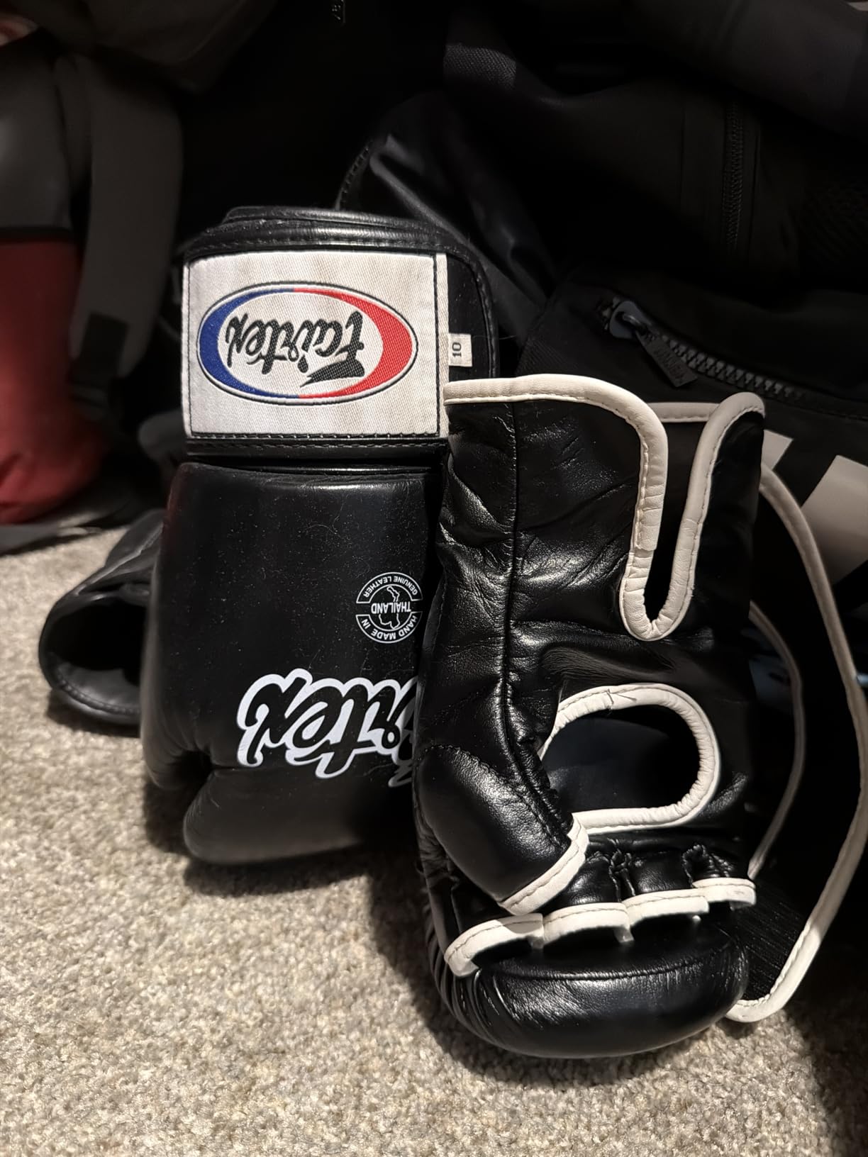 Fairtex FGV18 MMA Boxing Gloves, Leather Muay Thai Martial Arts Training | Full-grain hide with breathable mesh lining. Double-stitched wrist strap balances weight for bag drills and fitness routines customer photo 1