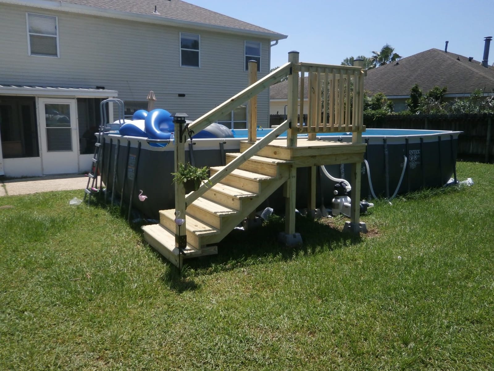 INTEX Ultra XTR 24ft x 12ft x 52in Above Ground Swimming Pool Set Bundle | 26363EH - 2100 GPH Sand Filter Pump, Ladder, Pool Cover & Ground Cloth with Inflatable Lounge Recliners (2-Pack) & Cooler customer photo 1