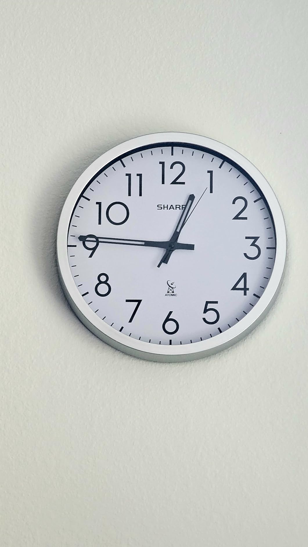Sharp 12-Inch Atomic Wall Clock, Battery Operated, Silver Brushed Finish | Self-setting atomic time; Easy-read analog face; Automatic time adjustment; Simple setup; Battery operated; Home or office customer photo 1
