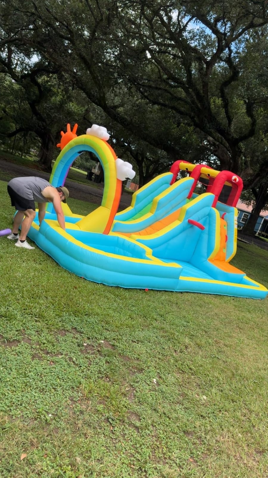 WELLFUNTIME Inflatable Water Double Slides Park with Blower, Bouncy Castle with Rainbow Water Curtain, with Shooting and Rock Climbing customer photo 1
