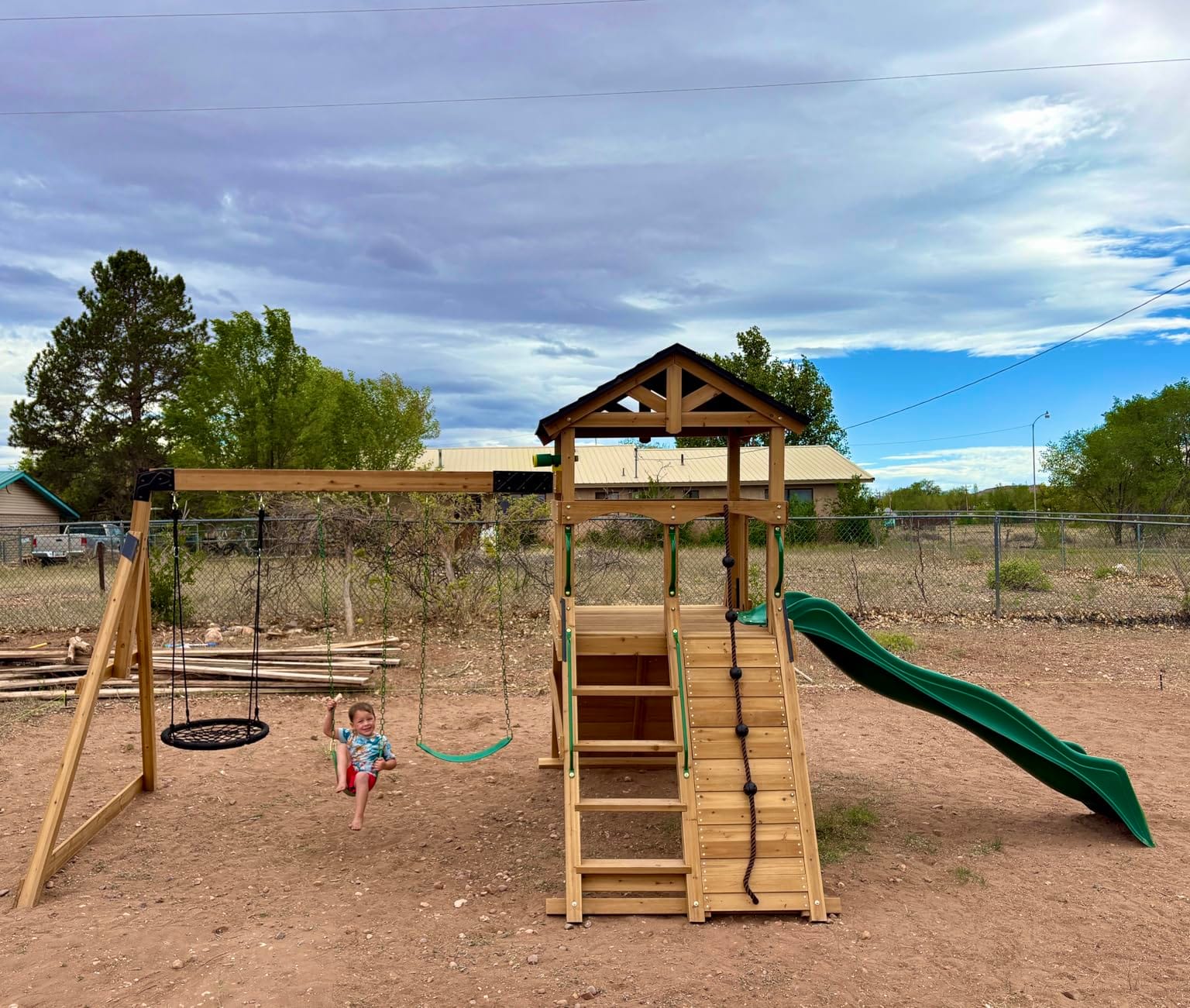 Backyard Discovery Endeavor II Cedar Wood Swing Set with Wave Slide, Play Deck, Double Rock Wall, Picnic Table, Climbing Wall, Belt Swings, Web Swing, Toy Telescope, Step Ladder, Outdoor Playset customer photo 2