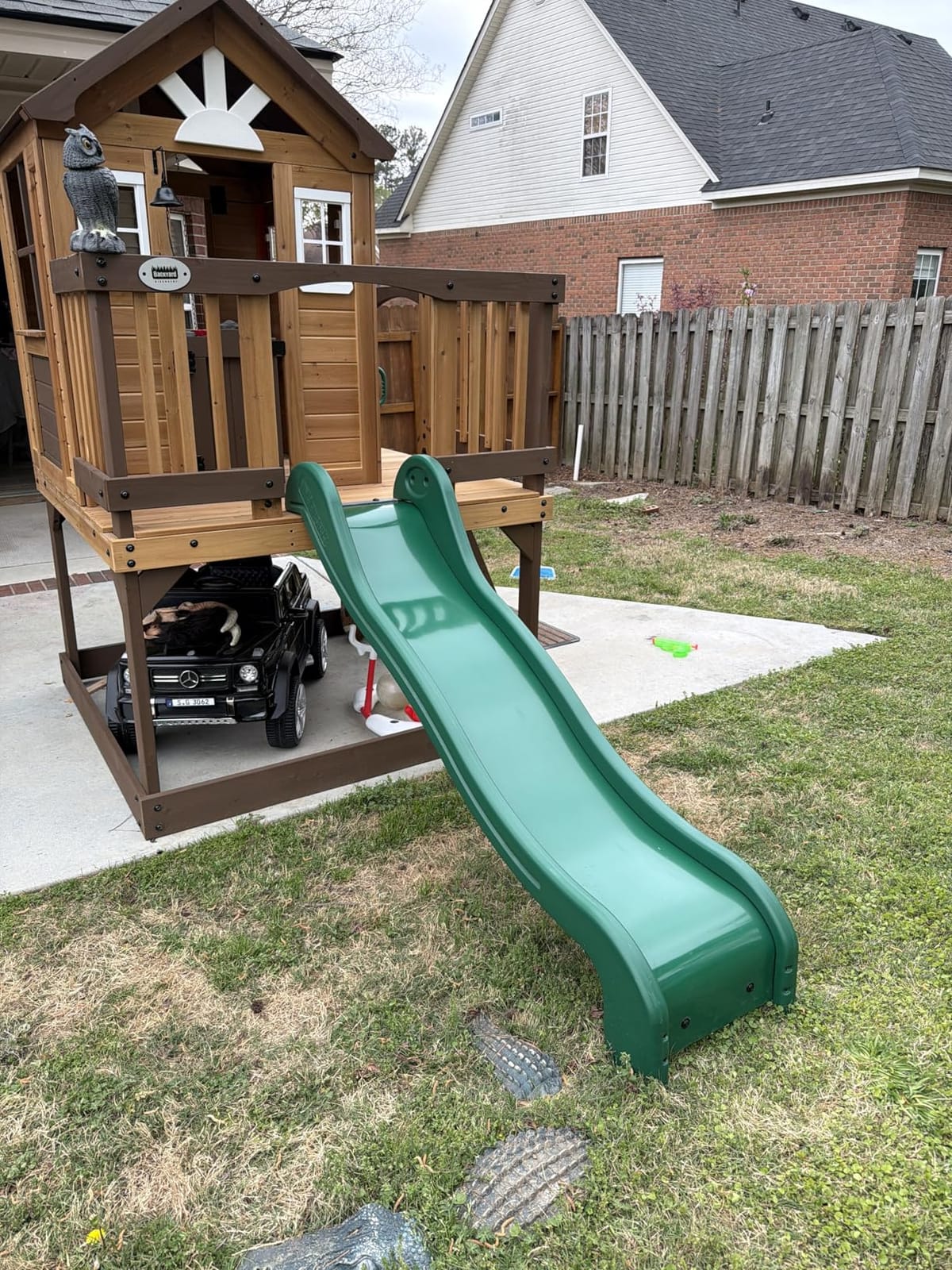 Backyard Discovery Sweetwater Heights White Elevated Cedar Wooden Kids Playhouse with Wave Slide, Play Kitchen, Step Ladder, Half Door, Wrap-Around Deck, Windows, Bell, Growth Chart for Outdoor Play customer photo 1