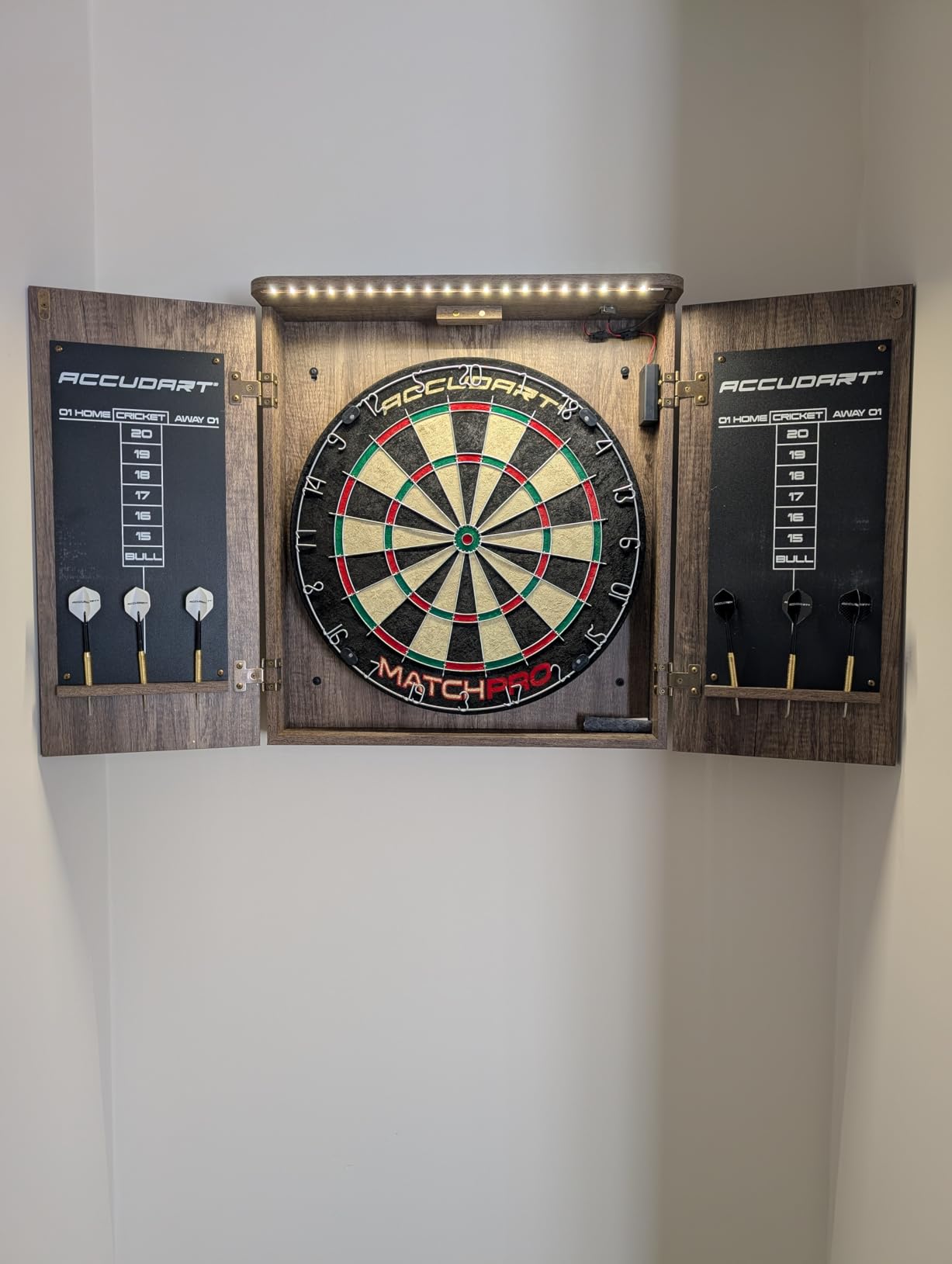 Accudart Match Pro Dartboard Cabinet Set with Auto LED | 18-inch sisal board. Auto LED lights on door open. Woodgrain cabinet with dart holders. Chalkboards. 6 darts included. customer photo 2