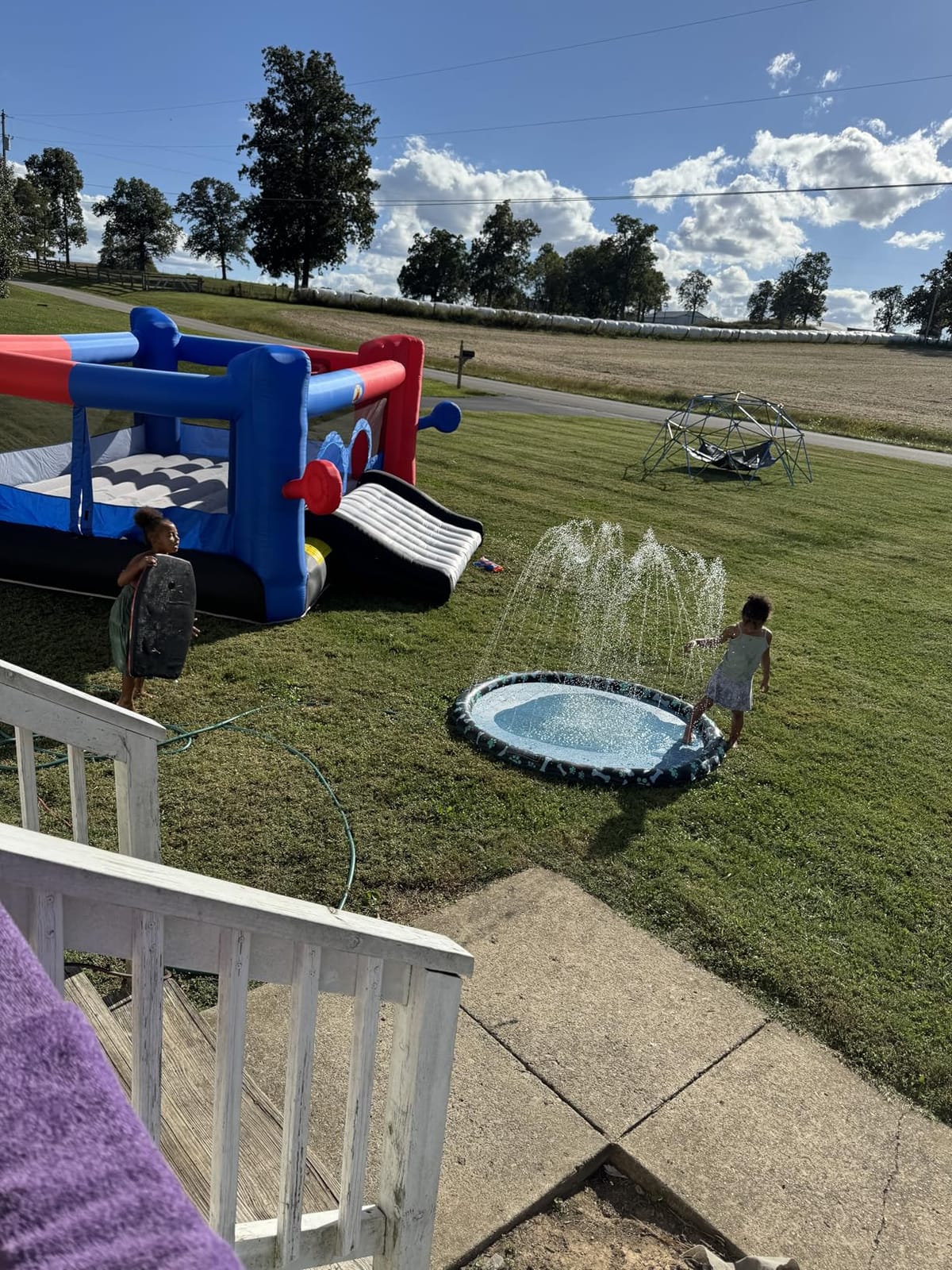 WELLFUNTIME Inflatable Bounce House with Blower, 15.3ft x 14.7ft | Jumping Castle with Dartboard, Dual Basketball Hoop, Dual Kicking Boards, Jumping Area for 6 Kids customer photo 1