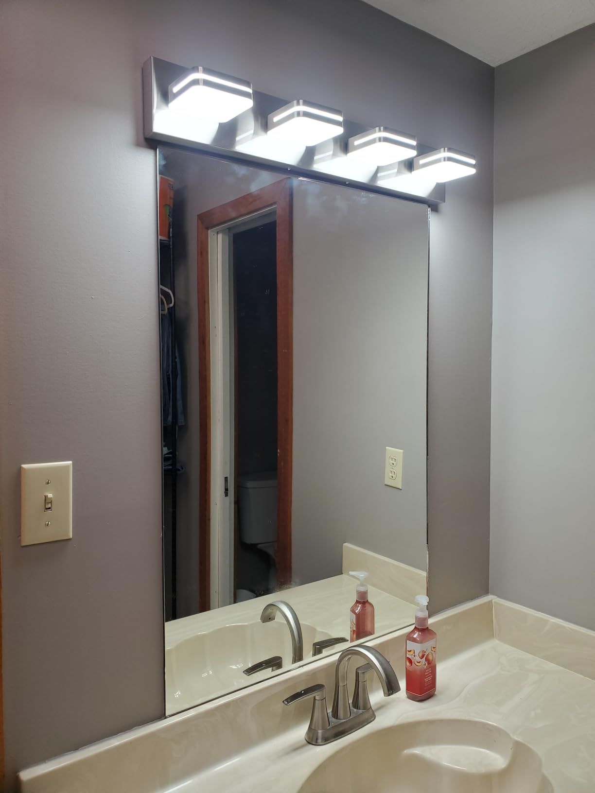 Torondo 360° Rotate LED Bathroom Vanity Light Fixtures, Acrylic Vanity Lights for Bathroom, Modern Wall Lighting Fixtures Over Mirror Living, Matte Black, Natural White, 4-Light, 27-Inch customer photo 1