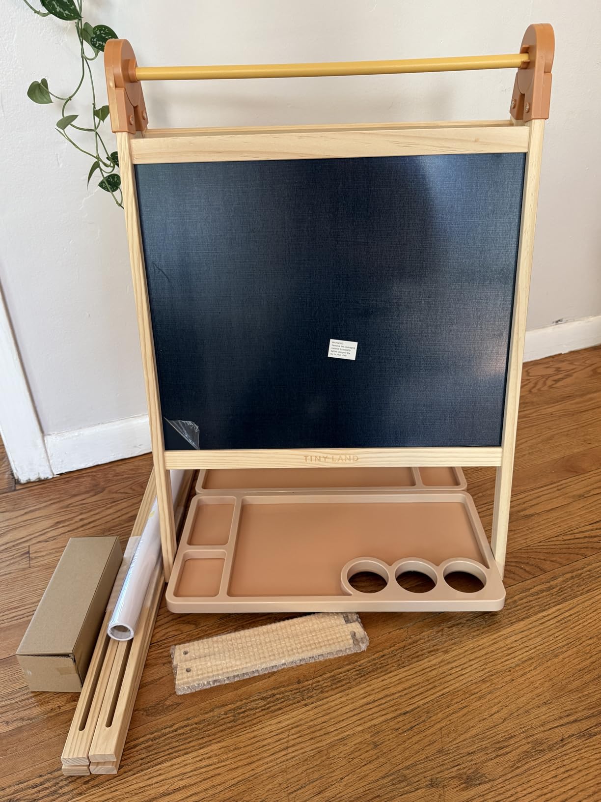 Tiny Land Foldable Wooden Art Easel for Kids, with Chalkboard & Whiteboard | Folds flat for storage, Tool-free, Double-sided board, 3 heights for ages 3-12, Paper roll included. Oatmeal accents customer photo 1