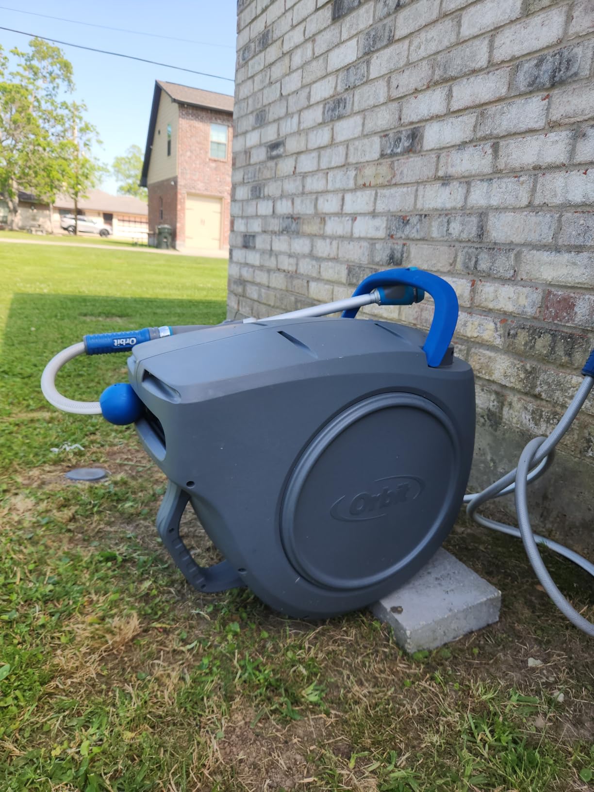 Orbit Auto-Retractable Garden Hose Reel, Wall Mount, 100ft x 5/8in - 28263 | Heavy-Duty 180 Degree Swivel Mount Hose Reel with 500 PSI Burst Strength for Easy Auto-Retractable Storage customer photo 1