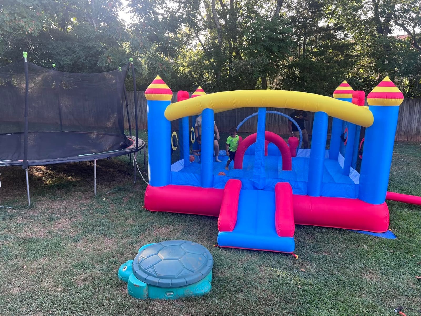 Big Inflatable Bounce House, Jumping Bouncy Castle for Kids, 18.7ft x 13ft, Outdoor Bouncer with Double Slide, Double Basketball Hoop, Fun Central Obstacle, Throw Ball Game, Reinforced Oxford Bounce Floor customer photo 1