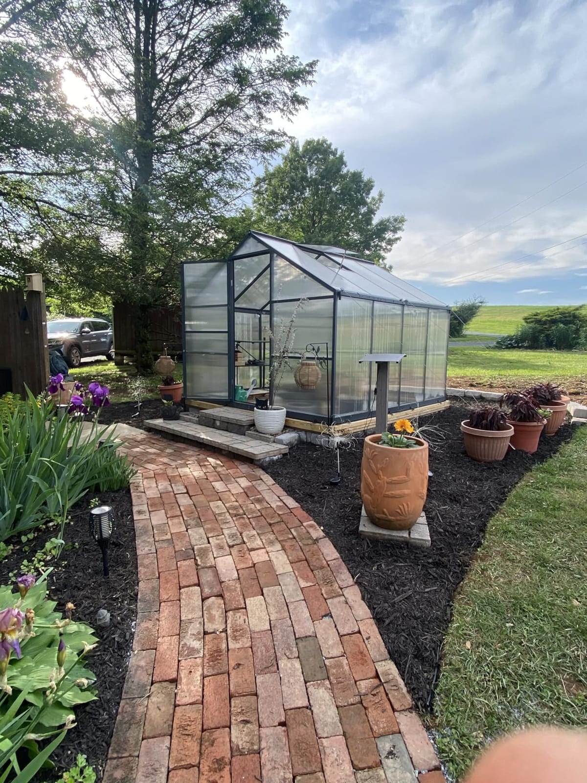 8 x 10 FT Outdoor Polycarbonate Greenhouse, Dark Gray | Large walk-in interior, reinforced aluminum frame, double-wall PC panels, two roof vents and rain gutters help plants thrive customer photo 1