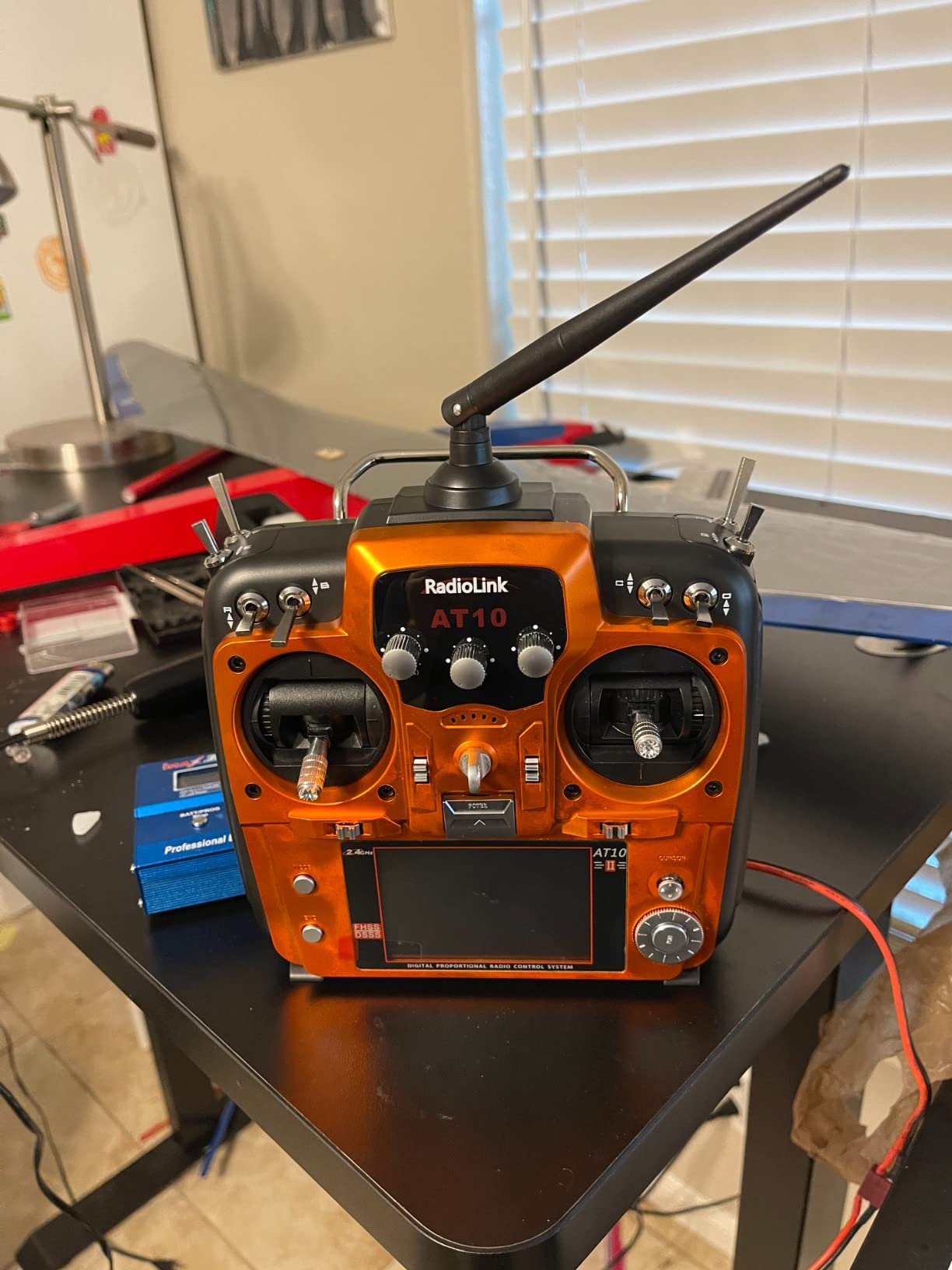 Radiolink AT10II 12CH 2.4G RC Transmitter and Receiver R12DS for Airplane | Voltage Telemetry Long Range Radio Controller for FPV RC Drone Quad Helicopter Car and Boat (Mode 2 Left Hand Orange) customer photo 1
