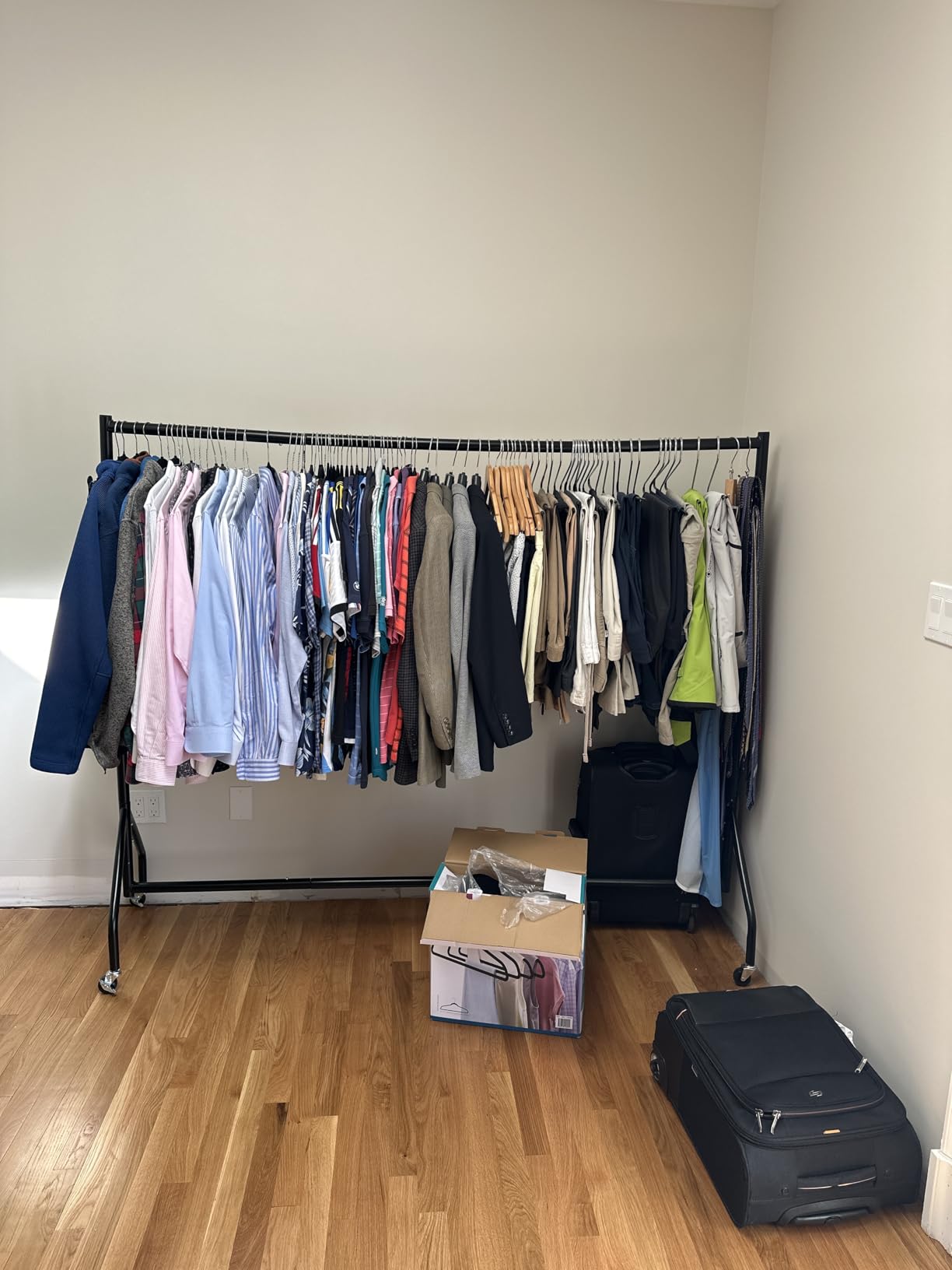 Amazon Basics Heavy Duty Portable Rolling Garment Rack, Hanging Clothes Organizer Rail for Display and Storage, Easy to Assemble, 72 x 60 inches, Black customer photo 1