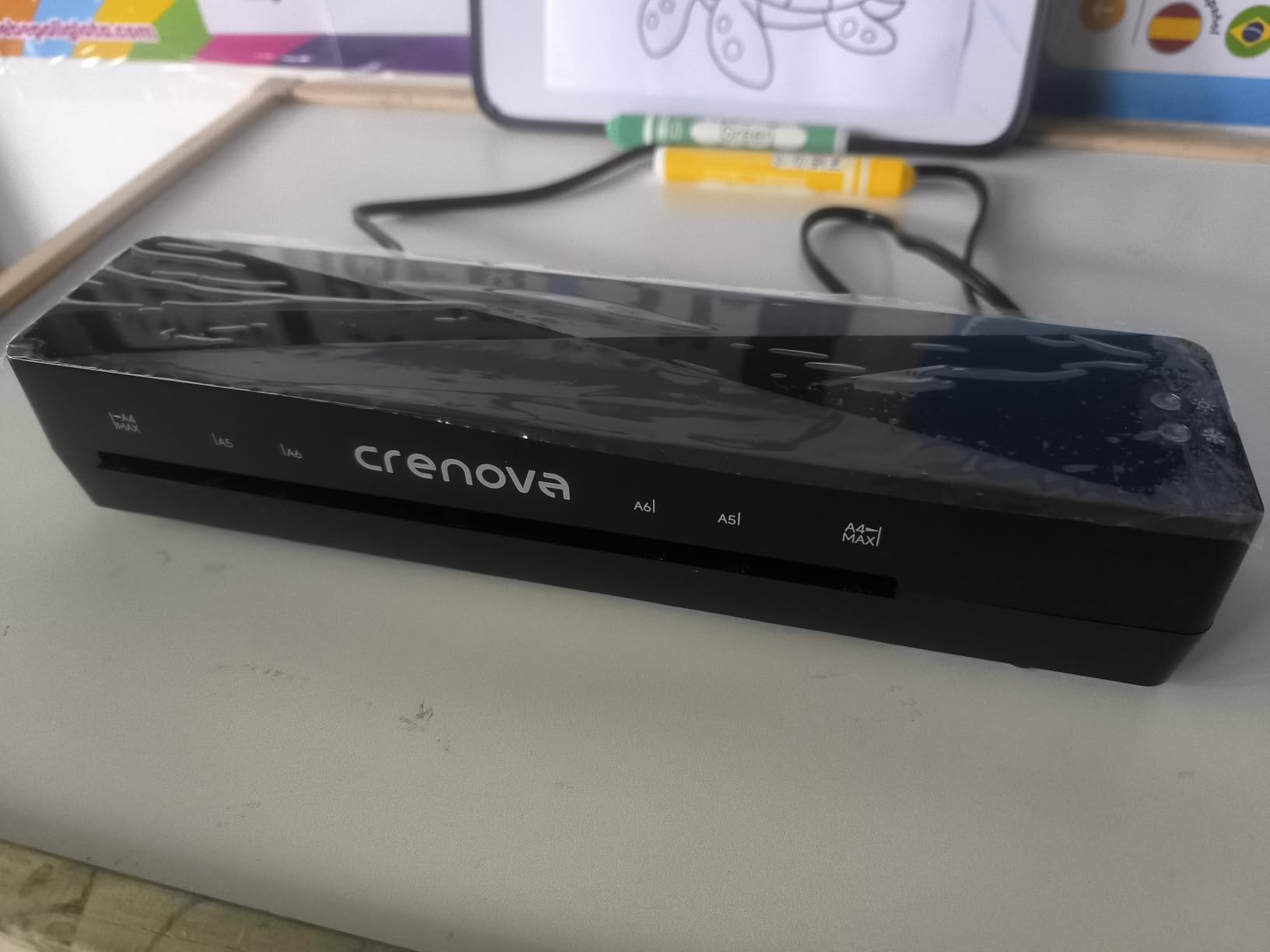 Crenova Laminator Machine with 10 Laminating Sheets, A4 Laminating Machine | Hot & Cold with Fast Warm Technology, Thermal Laminator 9 Inch for Home Office School Business Black customer photo 1