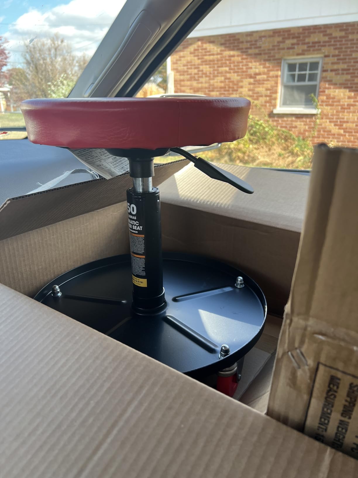 Torin ATRHL6201B Heavy Duty Rolling Pneumatic Creeper Garage/Shop Seat: Padded Adjustable Mechanic Stool with Tool Tray Storage, Red 250 LBS customer photo 2