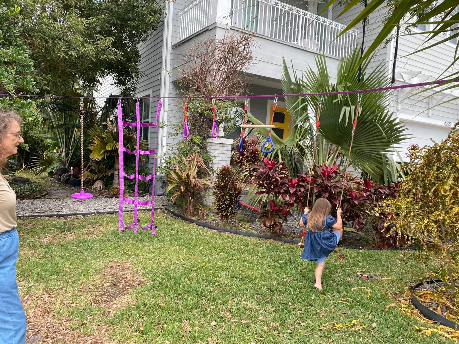 AOBOTE Ninja Warrior Obstacle Course for Kids,2x56ft Slackline with 12 Accessories,Saucer Swing with 360 Degree Rotating Wheel,Ninja Course for Kids Outside(AB010001-3) customer photo 2