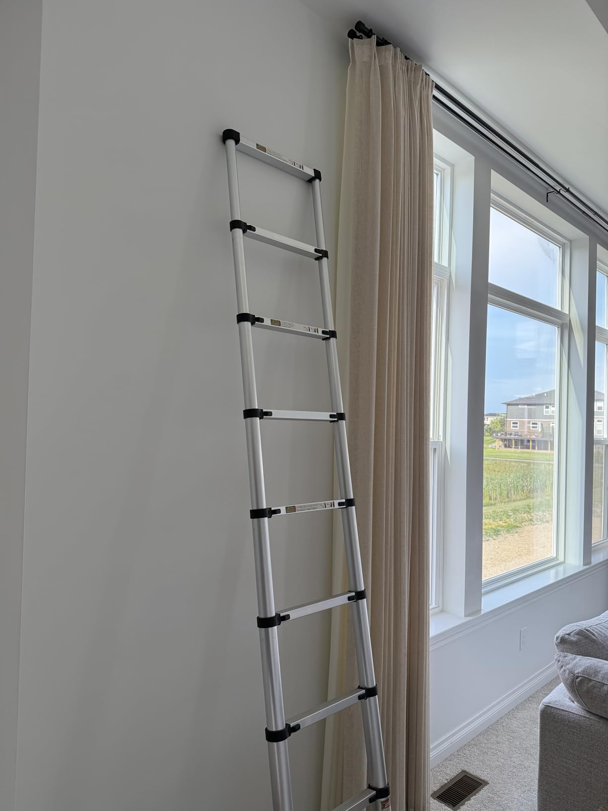 RIKADE A-Frame Telescoping Ladder with 1-Button Retraction, Aluminum Adjustable Extension Ladder, Portable Lightweight Folding Design for Home/RV Use, 330lb Capacity(1.4+1.7M) customer photo 1